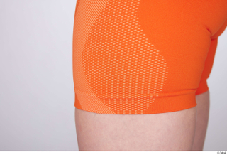 Unaisa dressed leg orange bike shorts sports white sports bra…